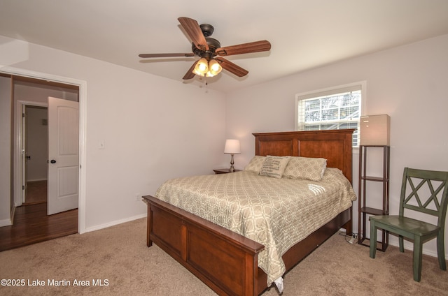 32 Dennis Creek Cir, Jacksons Gap, AL 36861 - bedroom featuring light colored carpet and ceiling fan