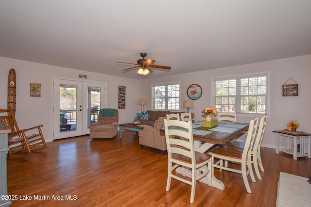dining space featuring ceiling fan, french doors, hardwood / wood-style floors, and a healthy amount of sunlight