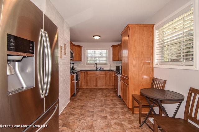 kitchen with sink and stainless steel appliances