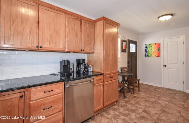 32 Dennis Creek Cir, Jacksons Gap, AL 36861 - kitchen featuring stainless steel dishwasher, decorative backsplash, dark stone counters, and brown cabinetry
