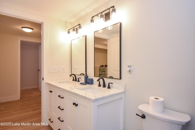 32 Dennis Creek Cir, Jacksons Gap, AL 36861 - bathroom with double vanity and wood finished floors
