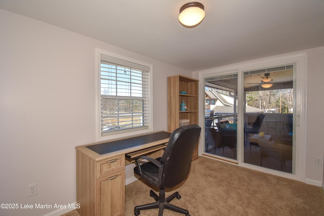 view of carpeted office space