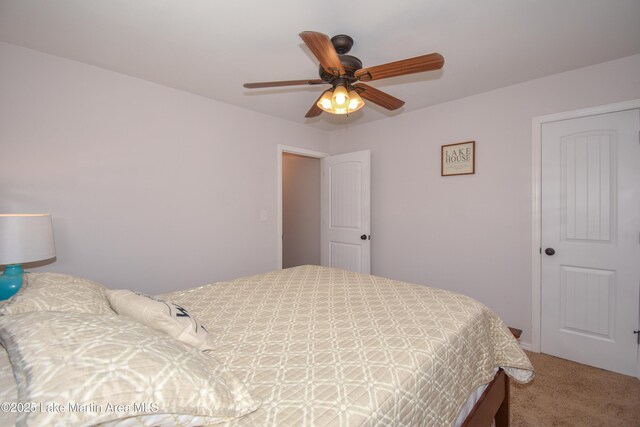 carpeted bedroom featuring ceiling fan
