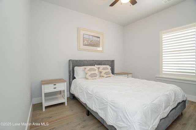 153 Whisper Trce, Tallassee, AL 36078 - bedroom with wood finished floors and ceiling fan