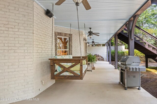 view of patio / terrace featuring a grill and ceiling fan