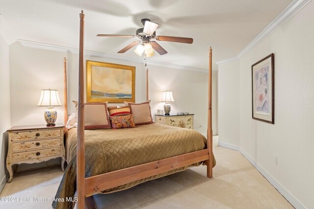 bedroom with crown molding, light colored carpet, and ceiling fan