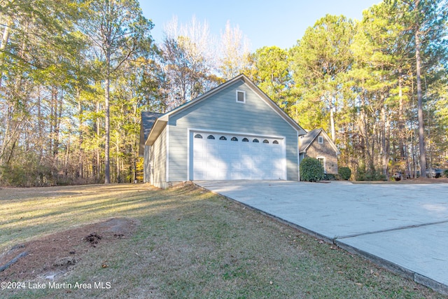 garage with a yard