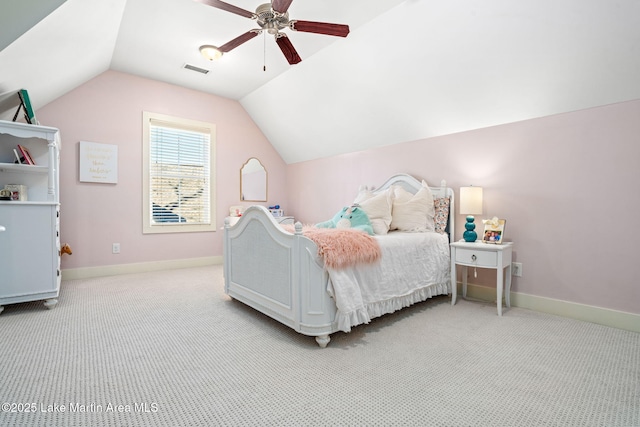 bedroom with light carpet, vaulted ceiling, and ceiling fan