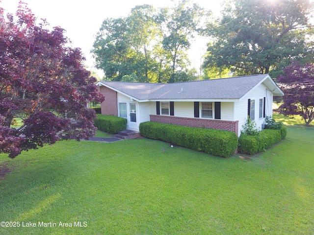 240 Windsor Dr, Alexander City, AL 35010 - single story home with a front yard and roof with shingles