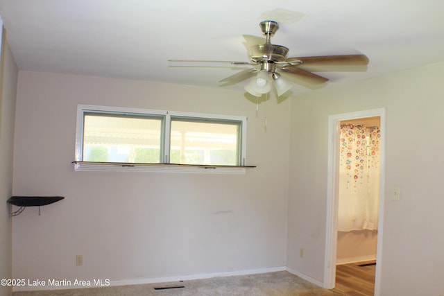 240 Windsor Dr, Alexander City, AL 35010 - spare room with healthy amount of natural light, ceiling fan, and baseboards