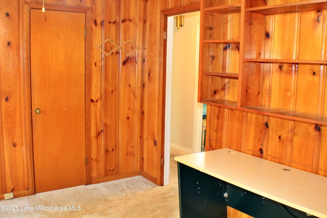 240 Windsor Dr, Alexander City, AL 35010 - unfurnished office featuring light carpet, baseboards, and wood walls