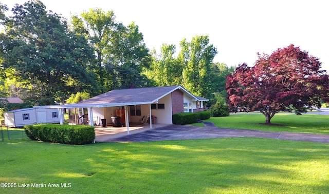 240 Windsor Dr, Alexander City, AL 35010 - rear view of property featuring driveway and an attached carport