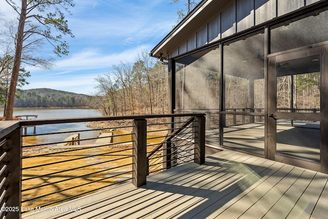 deck featuring a water view