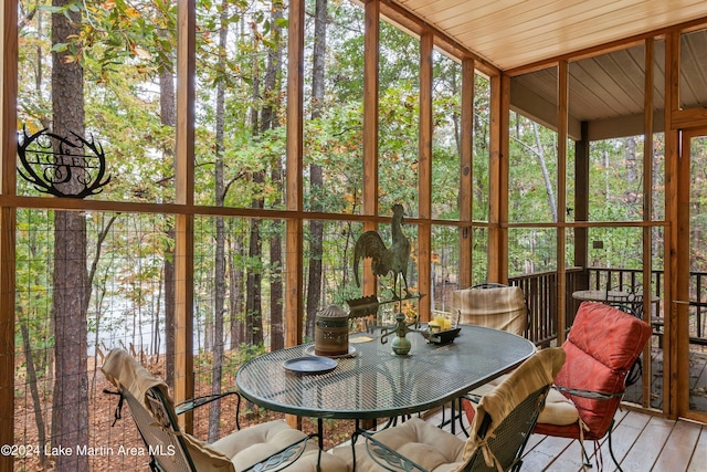 sunroom with wooden ceiling