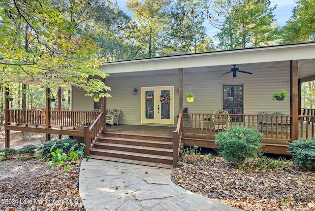 view of front of home with french doors and ceiling fan