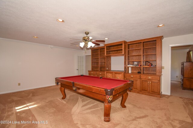 rec room with light carpet, a textured ceiling, and billiards