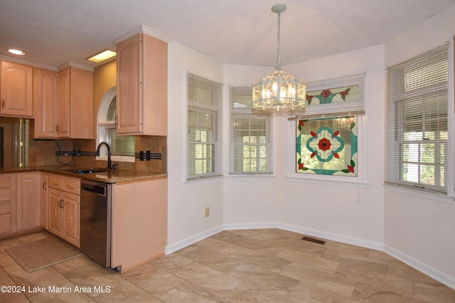 kitchen with tasteful backsplash, sink, pendant lighting, light brown cabinets, and dishwasher