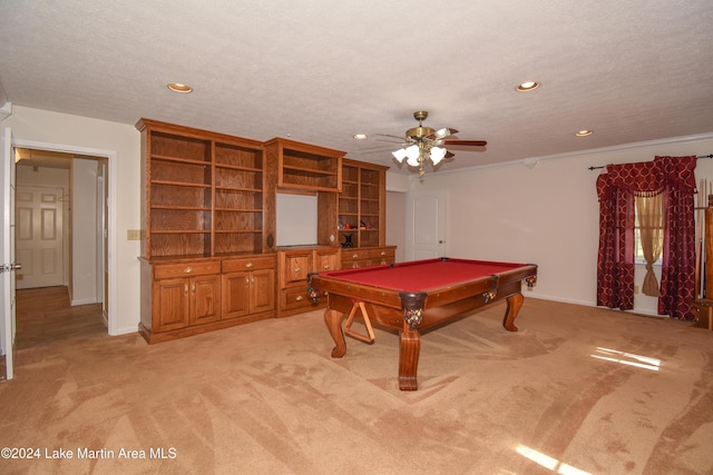 game room featuring light carpet, a textured ceiling, ceiling fan, and billiards