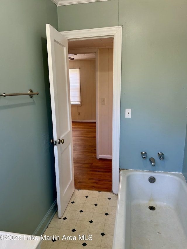 bathroom featuring a tub to relax in