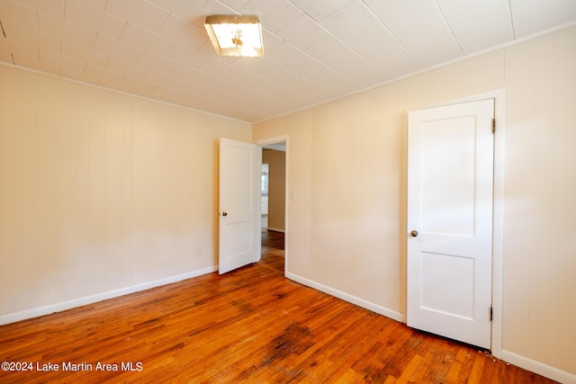 empty room featuring hardwood / wood-style floors