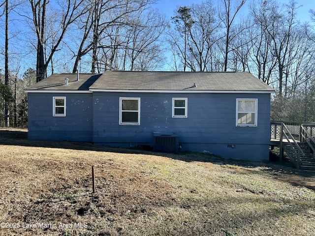 back of property featuring central AC unit