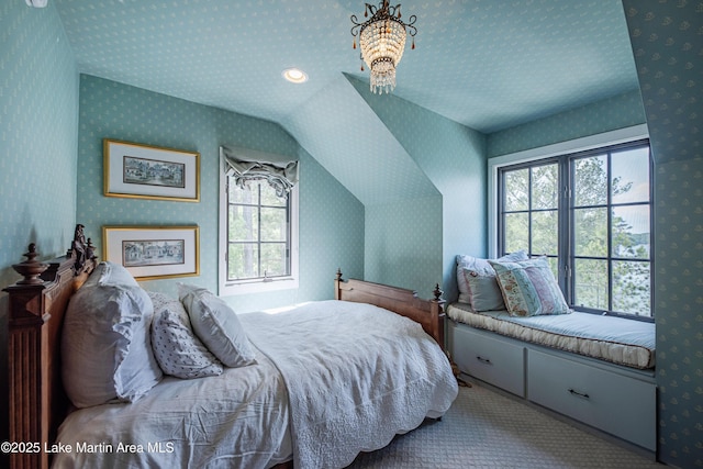 1071 Trillium W Pkwy, Eclectic, AL 36024 - bedroom with carpet floors, multiple windows, wallpapered walls, and lofted ceiling