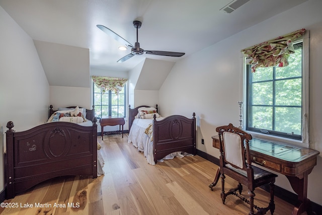 1071 Trillium W Pkwy, Eclectic, AL 36024 - bedroom featuring ceiling fan, visible vents, vaulted ceiling, baseboards, and light wood-style floors