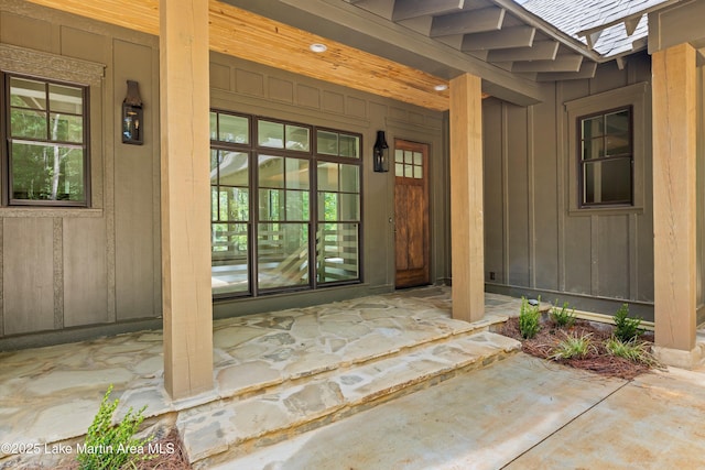 74 Cedar Rdg, Alexander City, AL 35010 - doorway to property with board and batten siding and a porch
