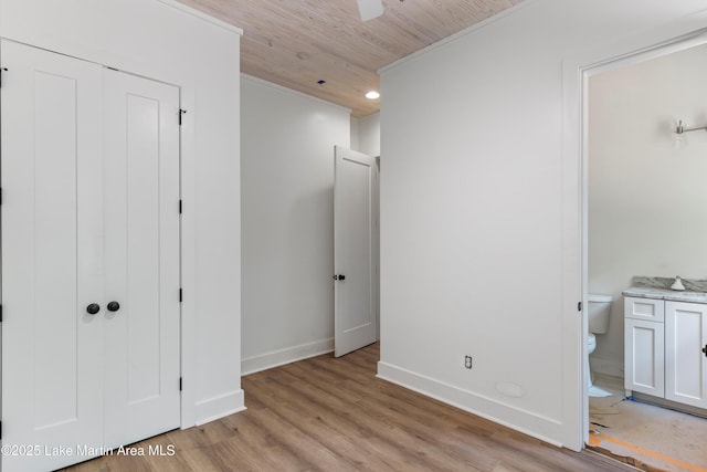 74 Cedar Rdg, Alexander City, AL 35010 - unfurnished bedroom featuring wood ceiling, light wood-style flooring, baseboards, and a closet