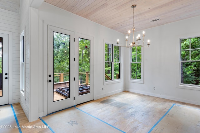 74 Cedar Rdg, Alexander City, AL 35010 - entryway featuring a chandelier, wood ceiling, light wood-type flooring, and baseboards