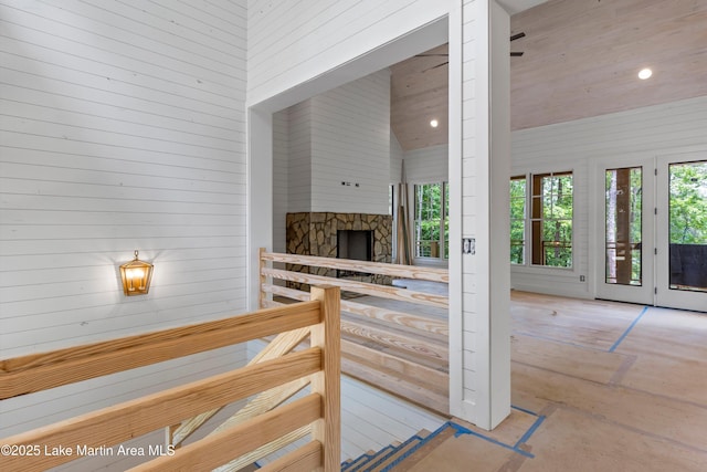 74 Cedar Rdg, Alexander City, AL 35010 - stairway with a stone fireplace and recessed lighting