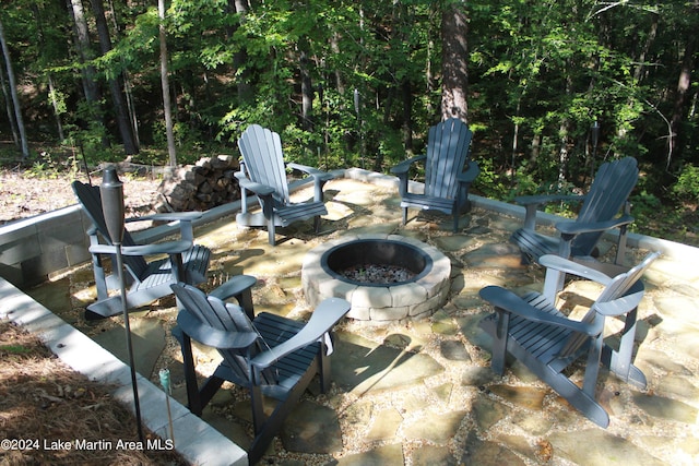 view of patio with a fire pit