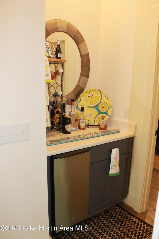 bathroom with vanity and wood-type flooring