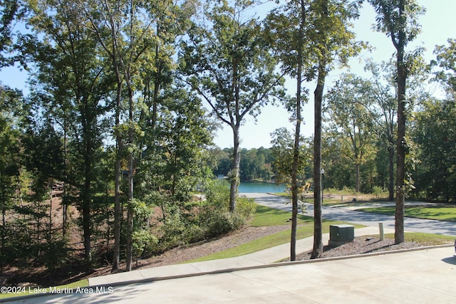 surrounding community featuring a water view