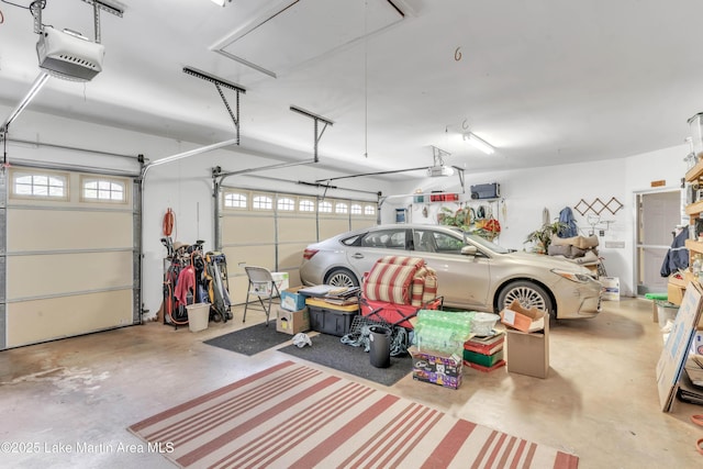 garage featuring a garage door opener