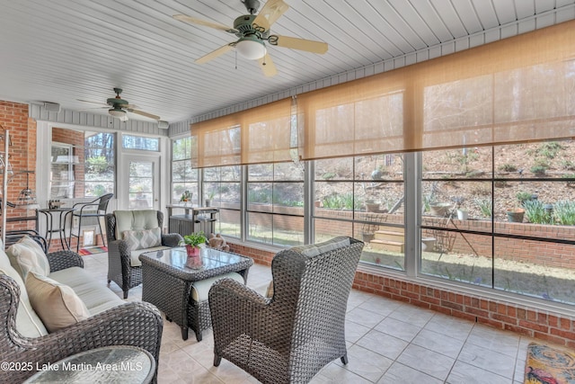 sunroom / solarium with ceiling fan