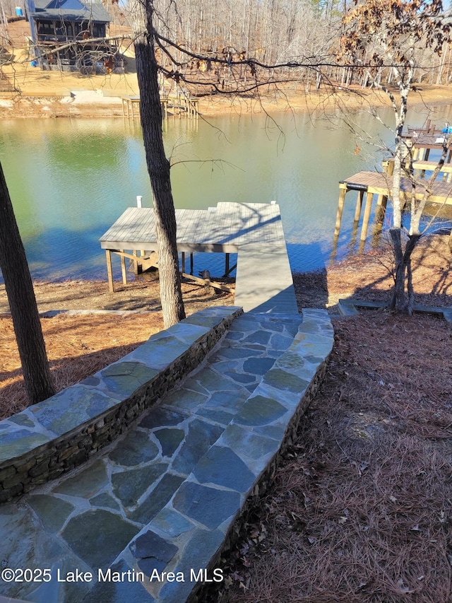 dock area featuring a water view