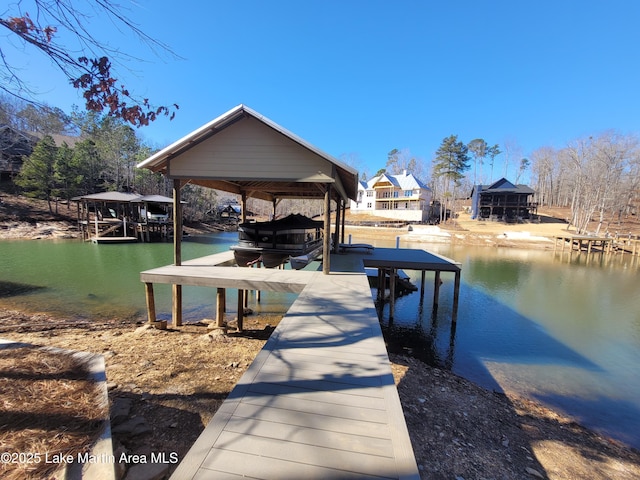 dock area with a water view