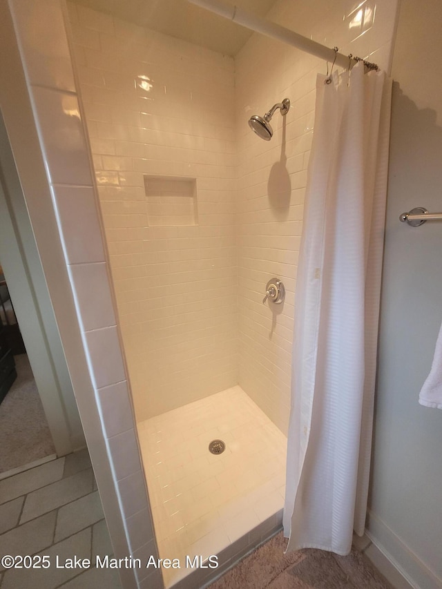 bathroom featuring curtained shower