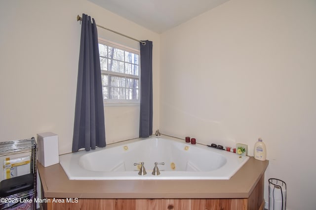 bathroom featuring a whirlpool tub