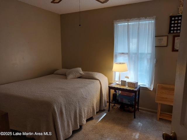 bedroom featuring baseboards