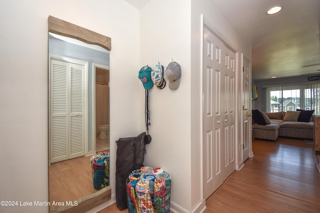 hallway featuring hardwood / wood-style flooring