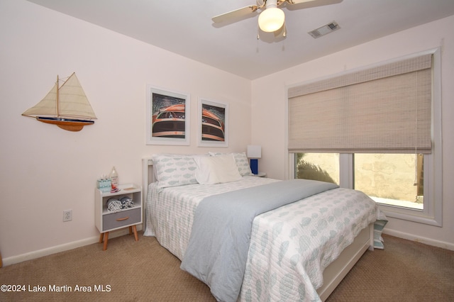 carpeted bedroom featuring ceiling fan