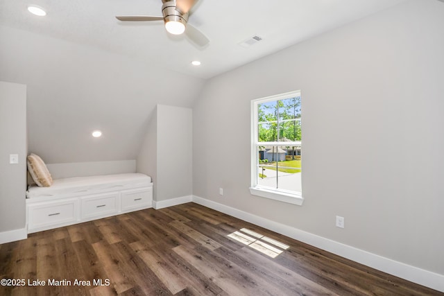 unfurnished bedroom with dark wood-style floors, vaulted ceiling, baseboards, recessed lighting, and a ceiling fan
