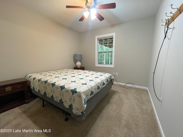 11 Redbud Ct, Dadeville, AL 36853 - carpeted bedroom with baseboards and a ceiling fan