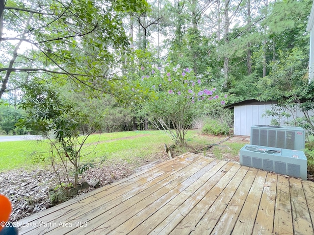 11 Redbud Ct, Dadeville, AL 36853 - wooden deck with a storage unit and a lawn