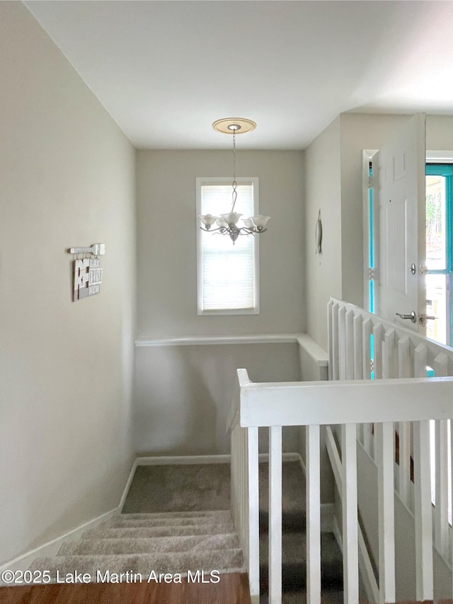 11 Redbud Ct, Dadeville, AL 36853 - stairway with a chandelier and carpet flooring