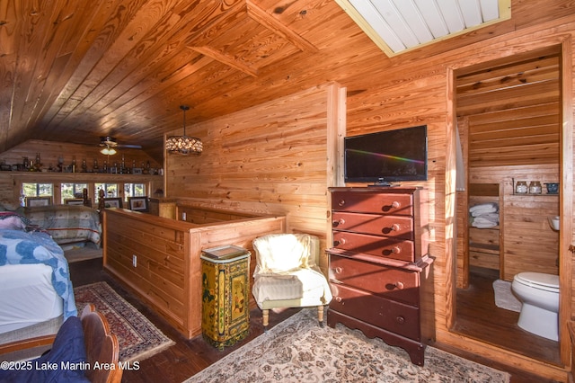 bedroom with dark hardwood / wood-style flooring, wood ceiling, wooden walls, and lofted ceiling