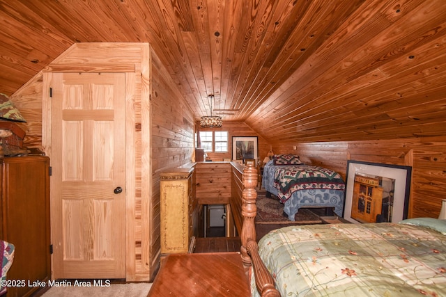 bedroom with lofted ceiling, wood ceiling, and wood walls