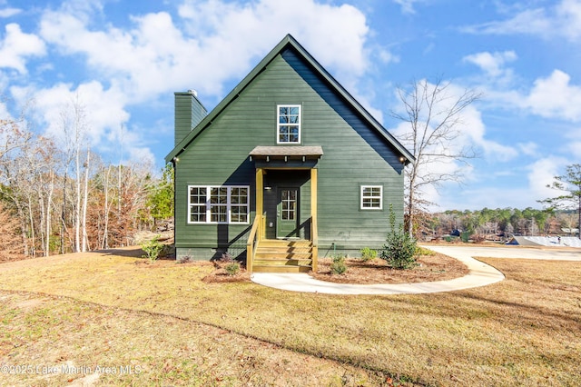 view of front of property with a front lawn